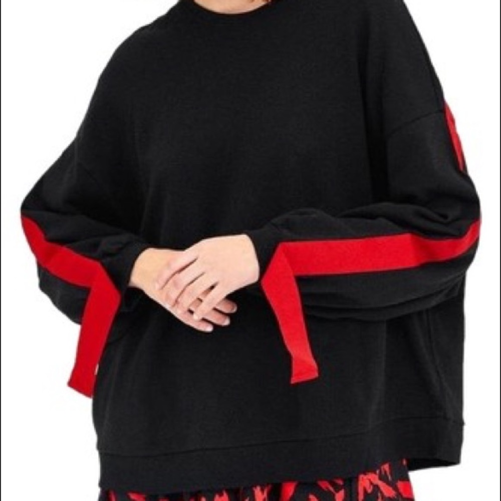 zara sweatshirt with red ribbon along the back